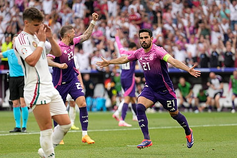 Ilkay Gundogan celebrates after scoring Germany's second goal